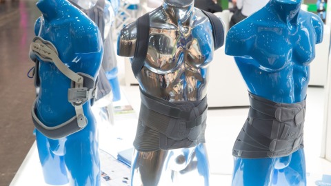 The glass hall of the Leipzig Trade Fair. The trade fair lake in the foreground.